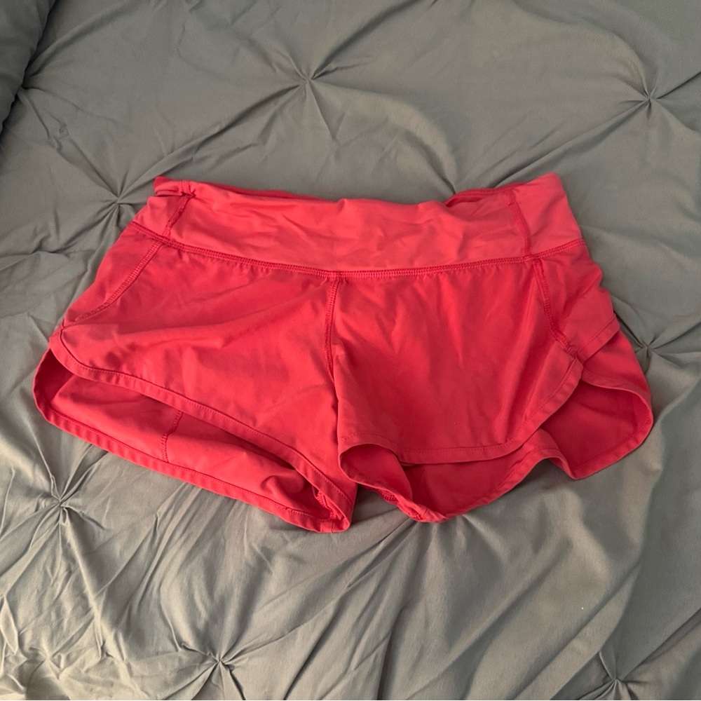 Pink Lululemon Athletic Shorts- speed ups size 4